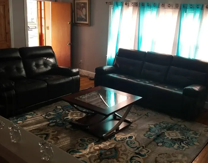 Delivered living room furniture set up in a home