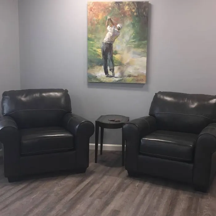 Sitting area with leather chairs