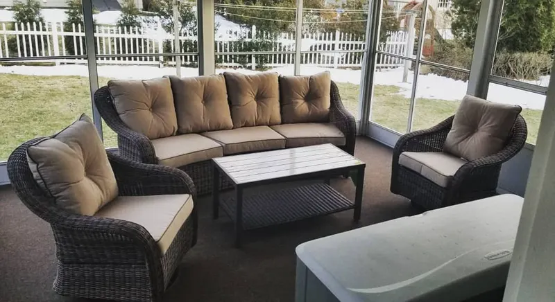 Patio furniture set staged in a sunroom